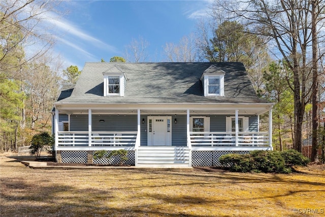 cape cod home with covered porch