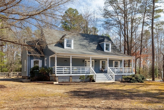 cape cod home with covered porch