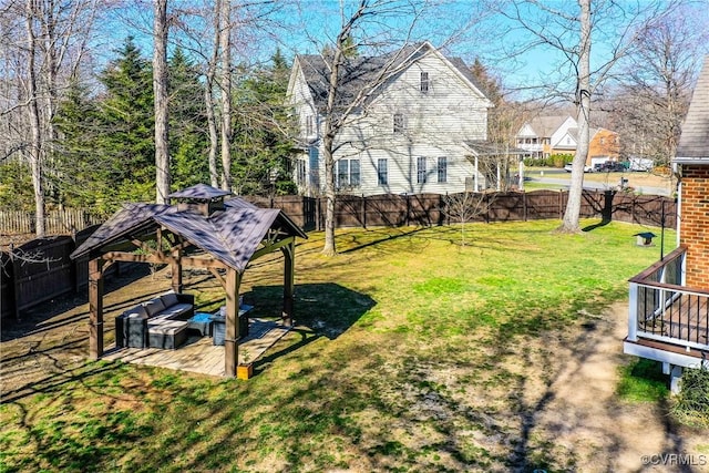 view of yard with a gazebo and a fenced backyard