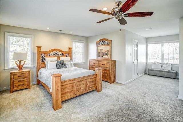 bedroom with recessed lighting, light colored carpet, baseboards, and ceiling fan