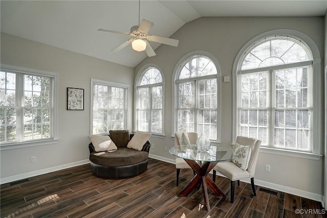 sunroom with a wealth of natural light, ceiling fan, and lofted ceiling