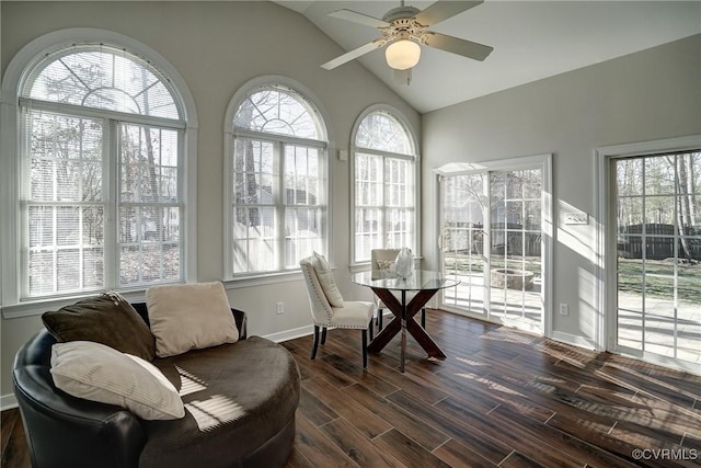 sunroom with a ceiling fan and vaulted ceiling