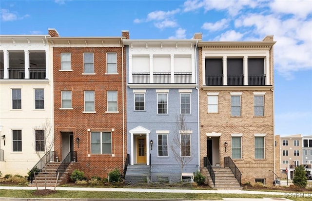 multi unit property featuring brick siding