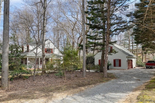 view of side of property with a garage