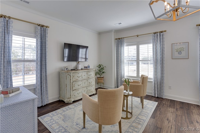 sitting room featuring a healthy amount of sunlight, dark wood-style flooring, and crown molding