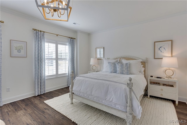 bedroom featuring baseboards, visible vents, ornamental molding, and wood finished floors