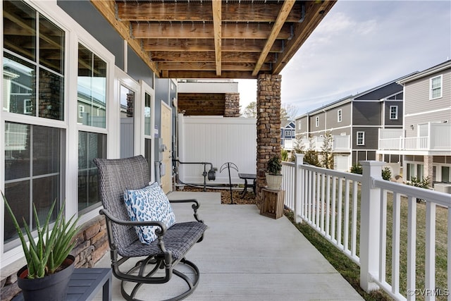 balcony with a residential view and a porch