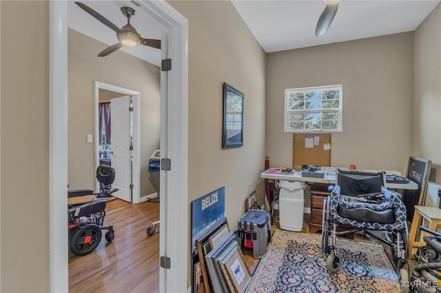 office with ceiling fan and wood finished floors