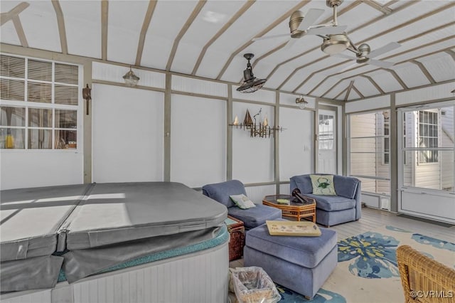 sunroom with ceiling fan