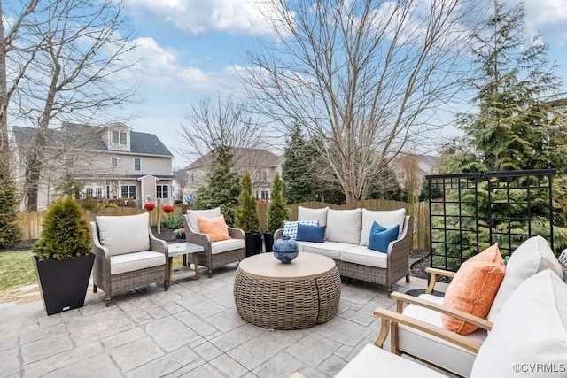 view of patio / terrace with fence and an outdoor living space