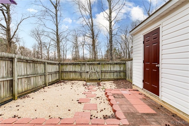 view of yard with a patio area and a fenced backyard