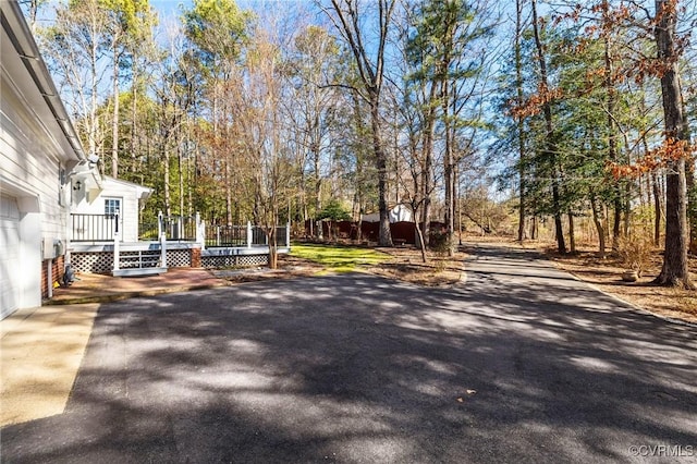 view of road with driveway