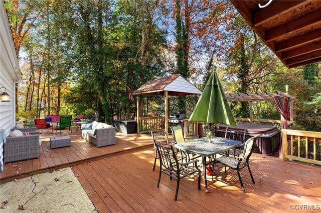 wooden terrace featuring outdoor dining space, an outdoor living space, and a pergola