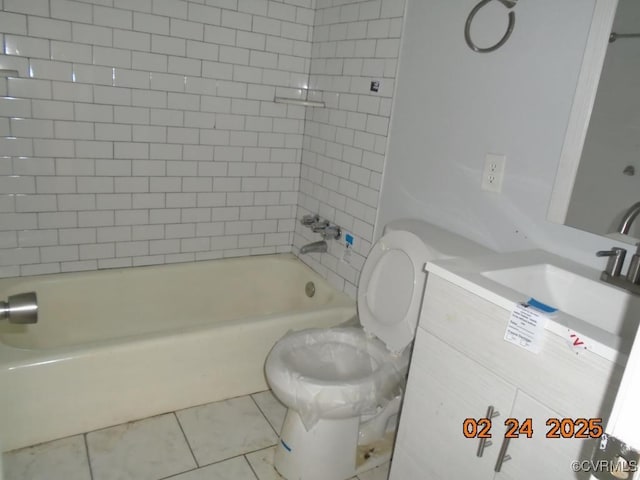 full bathroom with tile patterned flooring, tub / shower combination, vanity, and toilet