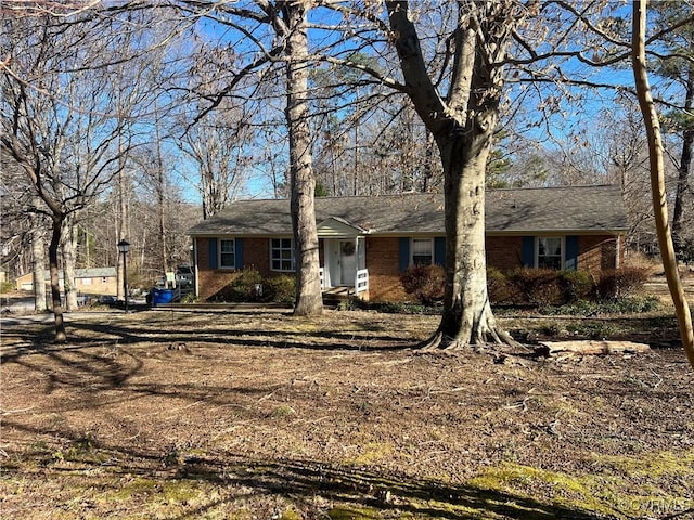 ranch-style home with brick siding