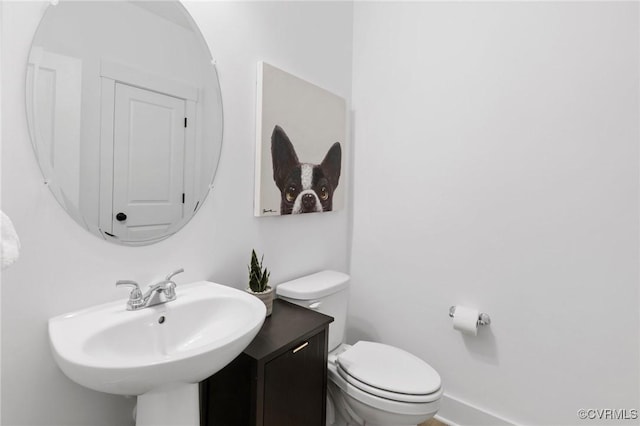 bathroom featuring a sink and toilet