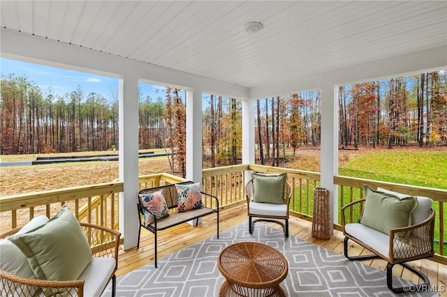 sunroom featuring a healthy amount of sunlight