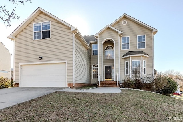 traditional-style home with a garage and concrete driveway