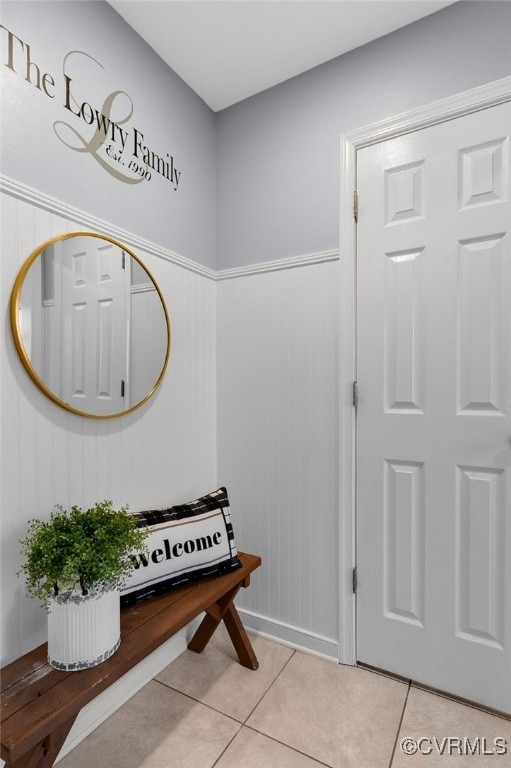 foyer with light tile patterned floors