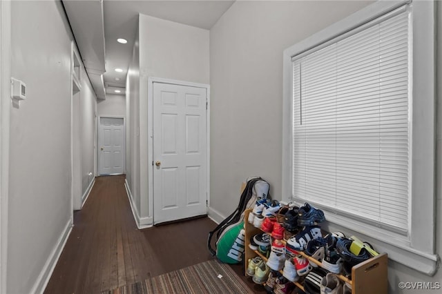 interior space with recessed lighting, baseboards, and wood finished floors