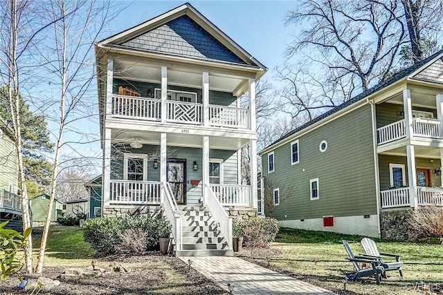 view of front of home featuring a porch and a balcony