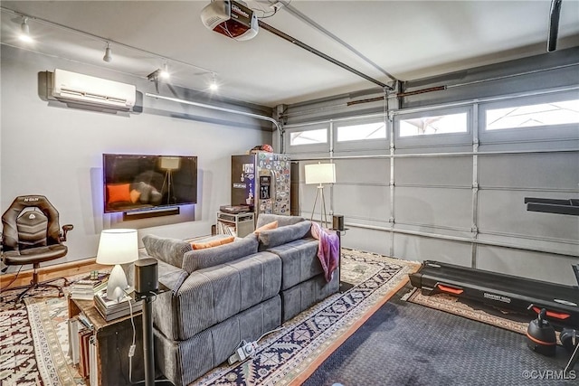 garage featuring a garage door opener, a wall unit AC, and stainless steel refrigerator with ice dispenser