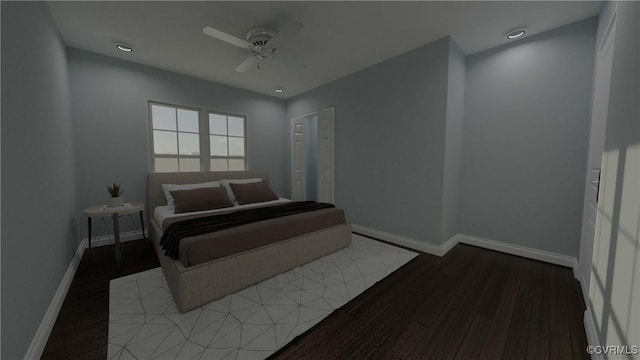 bedroom featuring wood finished floors, a ceiling fan, and baseboards