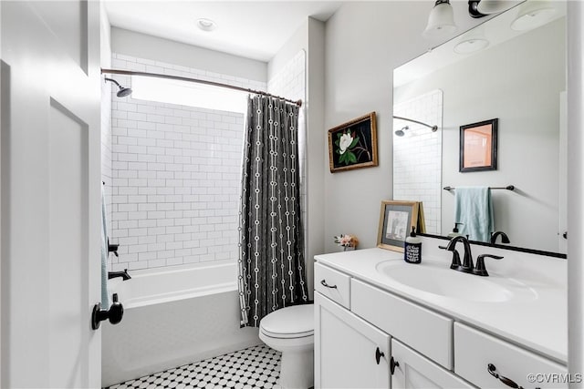 bathroom featuring vanity, toilet, and shower / tub combo with curtain