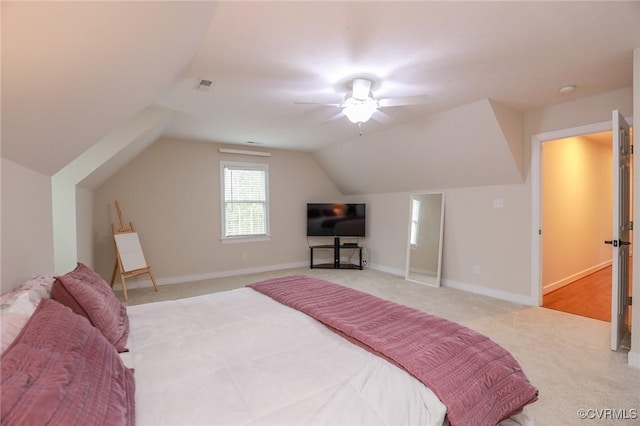 bedroom featuring light carpet, visible vents, and baseboards