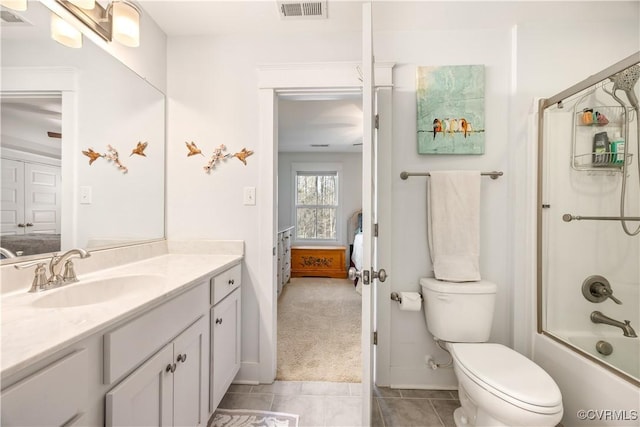 ensuite bathroom featuring toilet, ensuite bath, visible vents, and vanity