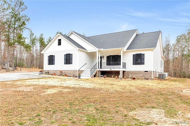 modern inspired farmhouse featuring covered porch, central AC, crawl space, and board and batten siding