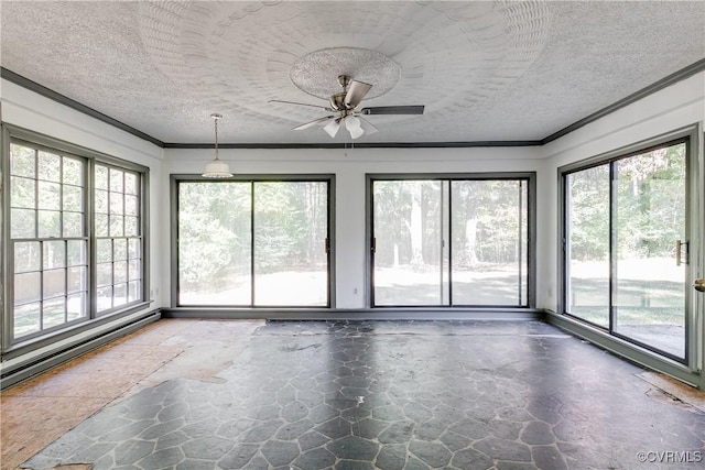 unfurnished sunroom with a ceiling fan