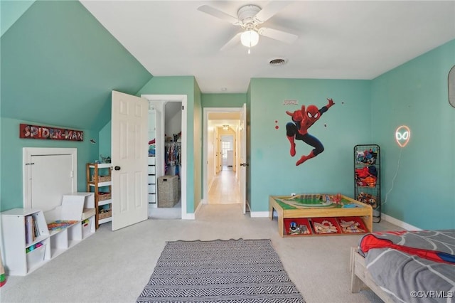 game room featuring baseboards, visible vents, a ceiling fan, lofted ceiling, and carpet flooring