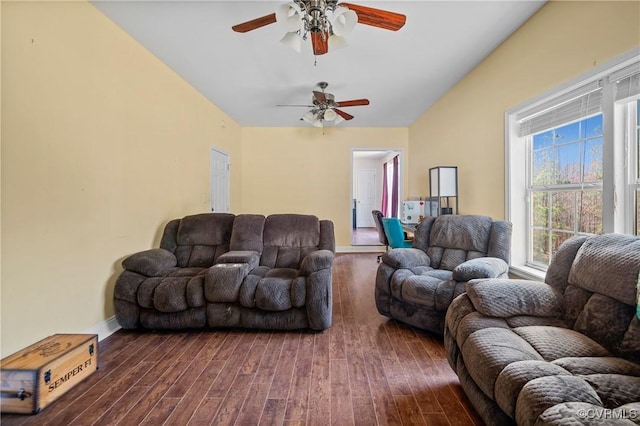 living room with dark wood finished floors, baseboards, and ceiling fan