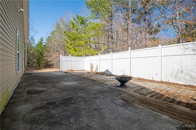 exterior space with a patio area and fence