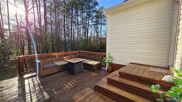 deck featuring a fire pit