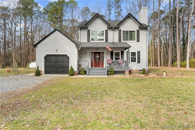 traditional home with a garage, driveway, crawl space, a chimney, and a front yard