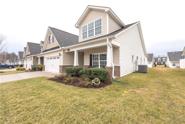 view of front of home featuring concrete driveway, a residential view, cooling unit, a front lawn, and brick siding