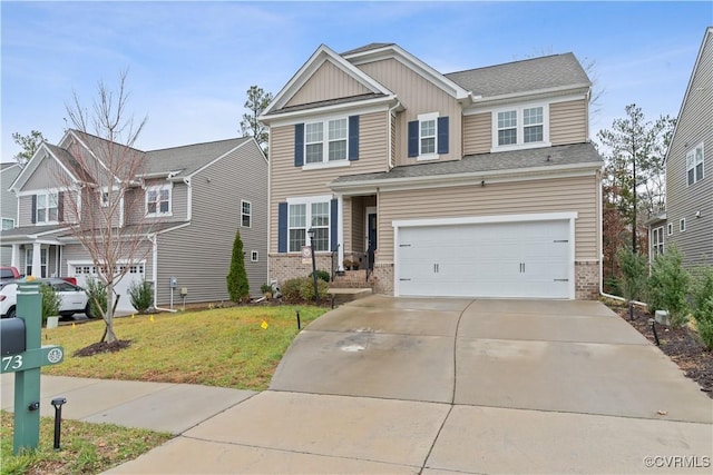 craftsman-style house with board and batten siding, a front yard, brick siding, and driveway