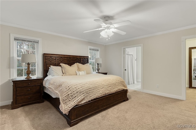 bedroom featuring light colored carpet, baseboards, and multiple windows