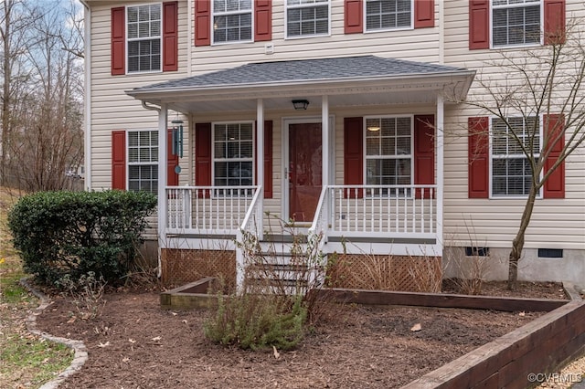 view of front of property with crawl space, a shingled roof, and a porch