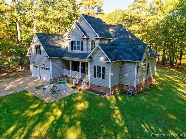 craftsman house featuring crawl space, covered porch, a front lawn, and roof with shingles