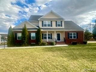 view of front of home featuring a front lawn