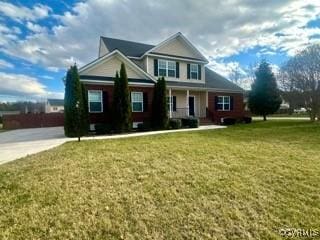 craftsman house with a porch and a front yard