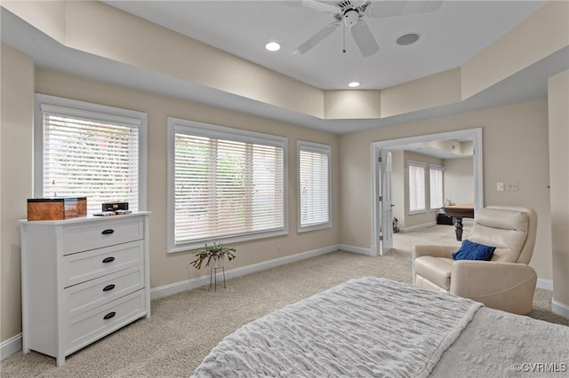 bedroom with recessed lighting, light colored carpet, ceiling fan, and baseboards