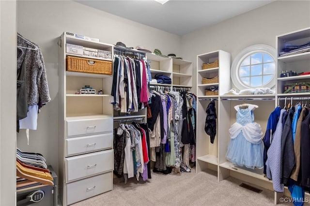 walk in closet with carpet and visible vents