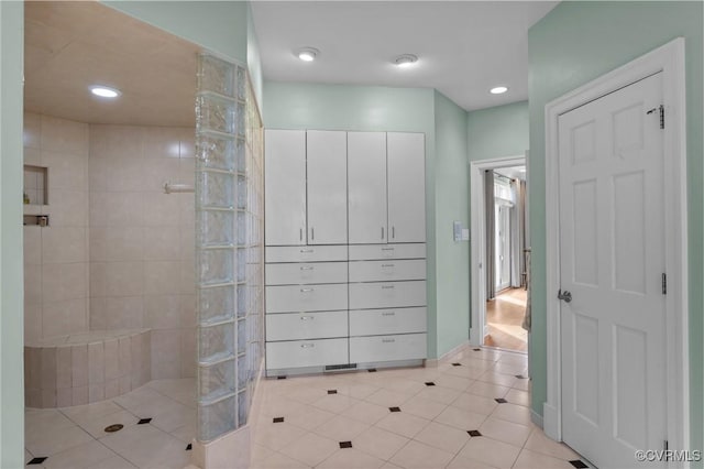 full bathroom with tile patterned floors, baseboards, a walk in shower, and recessed lighting