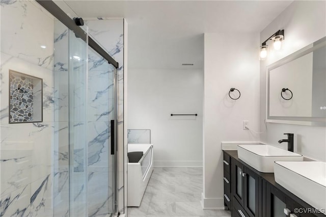 full bath featuring a bathing tub, vanity, baseboards, marble finish floor, and a marble finish shower