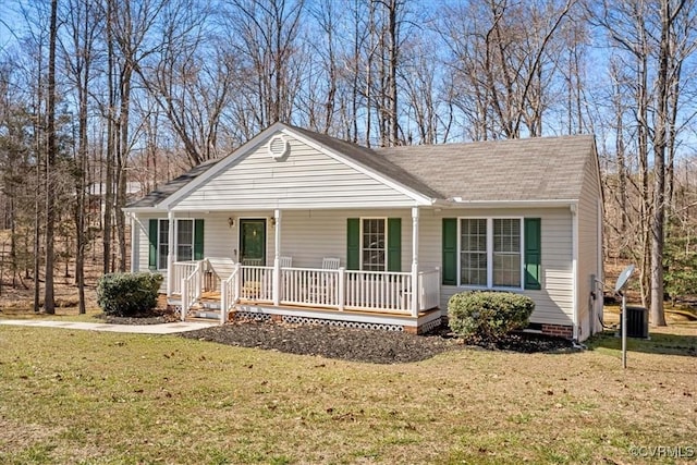 view of front facade with crawl space, covered porch, and a front lawn