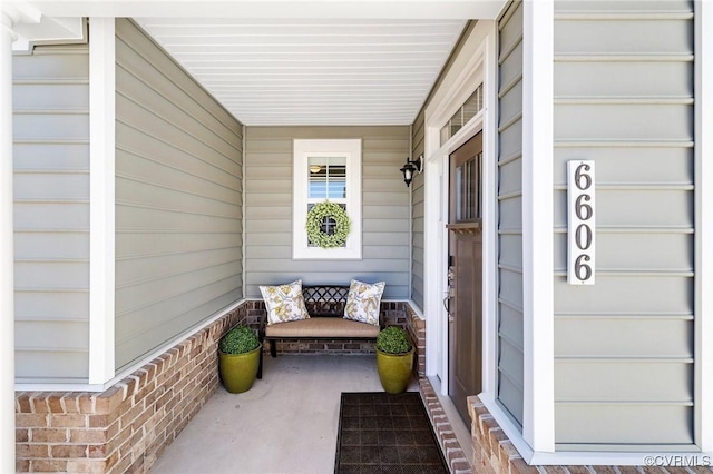 property entrance with a porch